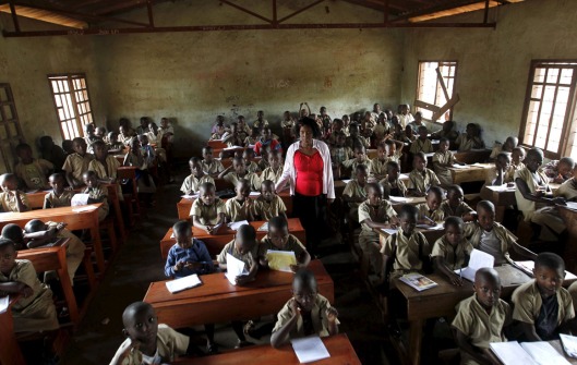 A teacher leads a class session at the ecole primaire Ave Marie in Burundi's capital Bujumbura, April 24, 2015. Nearly three years after Taliban gunmen shot Pakistani schoolgirl Malala Yousafzai, the teenage activist last week urged world leaders gathered in New York to help millions more children go to school. World Teachers' Day falls on 5 October, a Unesco initiative highlighting the work of educators struggling to teach children amid intimidation in Pakistan, conflict in Syria or poverty in Vietnam. Even so, there have been some improvements: the number of children not attending primary school has plummeted to an estimated 57 million worldwide in 2015, the U.N. says, down from 100 million 15 years ago. Reuters photographers have documented learning around the world, from well-resourced schools to pupils crammed into corridors in the Philippines, on boats in Brazil or in crowded classrooms in Burundi. REUTERS/Thomas Mukoya PICTURE 18 OF 47 FOR WIDER IMAGE STORY "SCHOOLS AROUND THE WORLD"SEARCH "EDUCATORS SCHOOLS" FOR ALL IMAGES